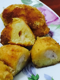 Una foto de Bocaditos de papa rellenas de camarón