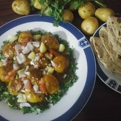 A picture of Khattey meethay aloo.