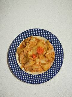 Una foto de Repollo con patatas y zanahorias rehogadas (Olla Gm g)