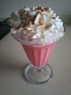 Una foto de Copa de crema de fresas