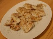 A picture of fried cod fish