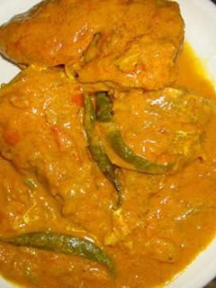 A picture of Fish in coconut curry.