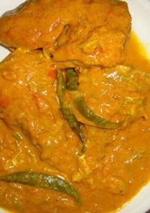 A picture of Fish in coconut curry.