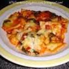 A picture of baked spinach ravioli.