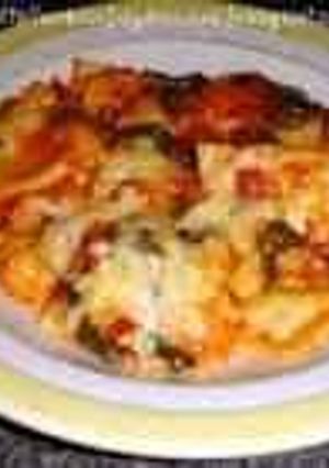 A picture of baked spinach ravioli.