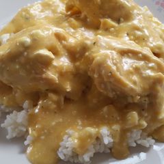A picture of Crockpot easy cheesy chicken and rice.