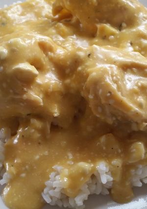 A picture of Crockpot easy cheesy chicken and rice.