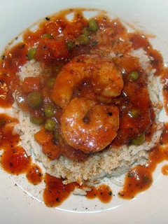 A picture of taisen's spicy shrimp sauce over rice.