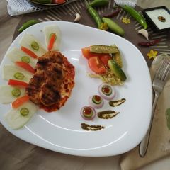 A picture of Grilled Chicken With Sauteed Vegetables.