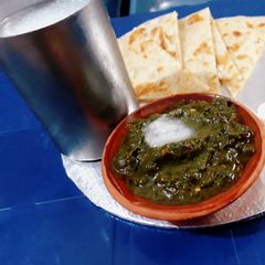 A picture of Saag &chawal ki roti.