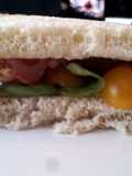 Bacon and Basil Sandwich with Goat Cheese Brie and Golden Tomatoes
