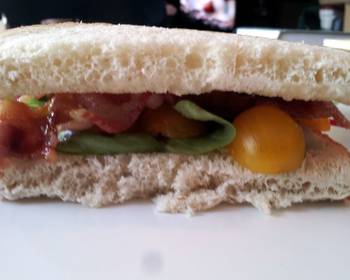 Ready to Serve Bacon and Basil Sandwich with Goat Cheese Brie and Golden Tomatoes Most Delicious