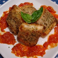 A picture of Pan Fried Pork-Wrapped Hanpen Fish Cakes with Basil.
