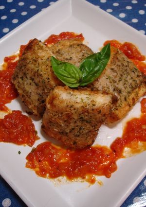 A picture of Pan Fried Pork-Wrapped Hanpen Fish Cakes with Basil.