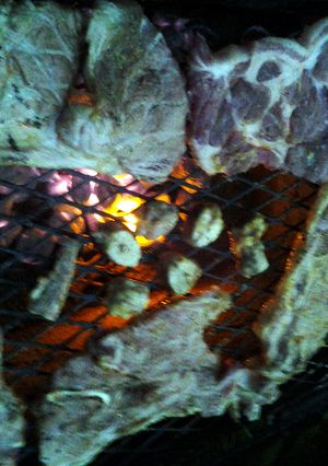 A picture of semi-grilled pork steak.