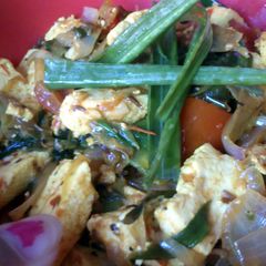 A picture of paneer & spring onions.