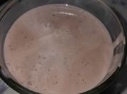 Una foto de chocolatada con leche en polvo