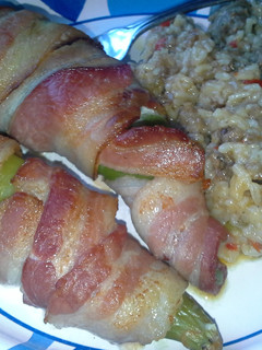 A picture of Bacon Wrapped Pulled Pork and Cream Cheese Stuffed Anaheim Peppers and Sausage and Peppers Rice.