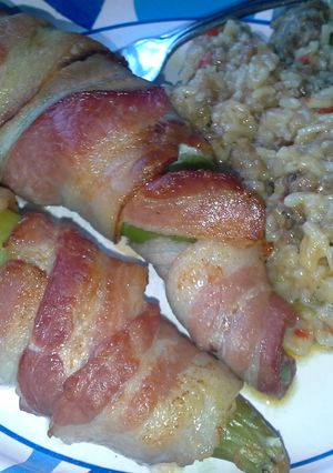 A picture of Bacon Wrapped Pulled Pork and Cream Cheese Stuffed Anaheim Peppers and Sausage and Peppers Rice.