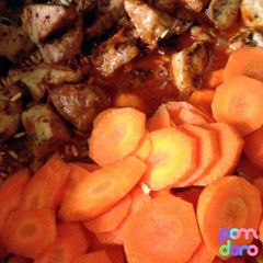 A picture of Arroz Amarillo con Carnitas/ Achiote Rice Supper with Pork Carnitas.
