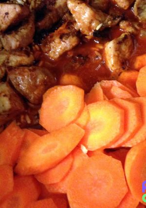 A picture of Arroz Amarillo con Carnitas/ Achiote Rice Supper with Pork Carnitas.