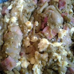 A picture of Sauteed asparagus and ham.