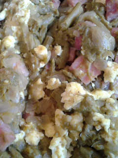 A picture of Sauteed asparagus and ham.
