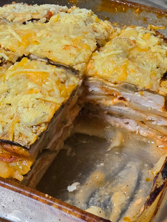 Una foto de Pastel de patata con pollo y berenjenas