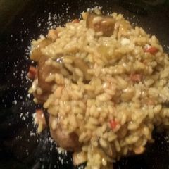 A picture of Meatball risoto with mushrooms.