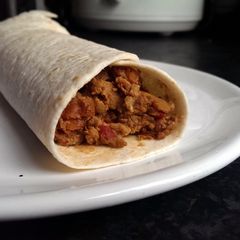 A picture of Sophie's Thai red curry breakfast wrap.