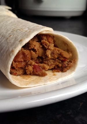 A picture of Sophie's Thai red curry breakfast wrap.