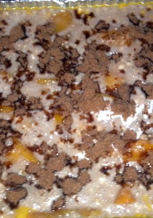 A picture of WARM AND GOOEY PEACH COBBLER.