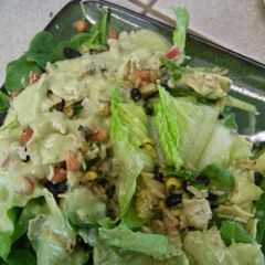 A picture of Avocado salad dressing with optional taco salad.