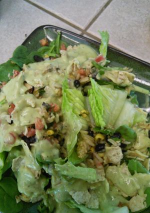 A picture of Avocado salad dressing with optional taco salad.