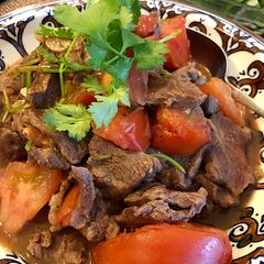 A picture of Beef & Tomato stir-fry.