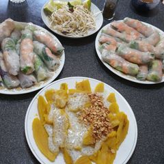 A picture of Vietnamese Summer Rolls with spicy garlic peanut sauce.