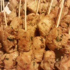 A picture of Basil Chicken Kabobs with honey mango chutney sauce.