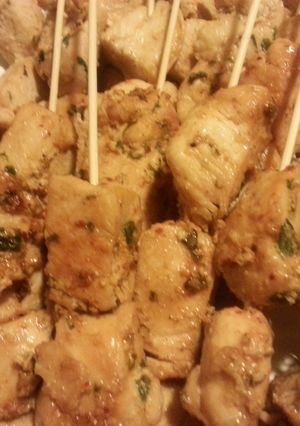 A picture of Basil Chicken Kabobs with honey mango chutney sauce.