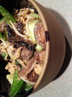A picture of Udon noodles with peanut sauce.