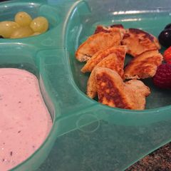 A picture of Mini Pancakes with Summer Berry Yogurt and Honey.