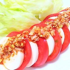 A picture of Silken Tofu and Tomatoes with Scallion Dressing.