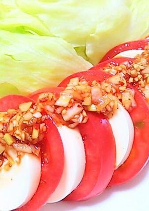 A picture of Silken Tofu and Tomatoes with Scallion Dressing.
