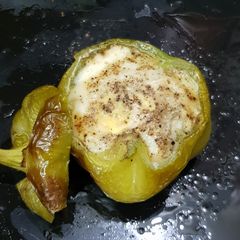 A picture of Baked egg in the bell pepper!.