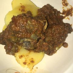 A picture of Sweet potatoes and gizzard stew.