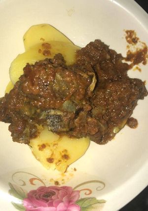A picture of Sweet potatoes and gizzard stew.
