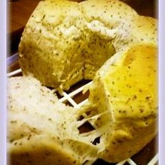 A picture of Sweet Milk Tea Ring Bread with Black Tea Leaves.