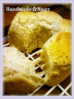 A picture of Sweet Milk Tea Ring Bread with Black Tea Leaves.