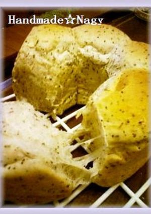 A picture of Sweet Milk Tea Ring Bread with Black Tea Leaves.