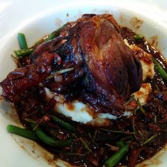 A picture of Lamb Shanks braised in Red Wine.
