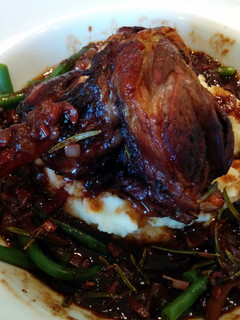A picture of Lamb Shanks braised in Red Wine.